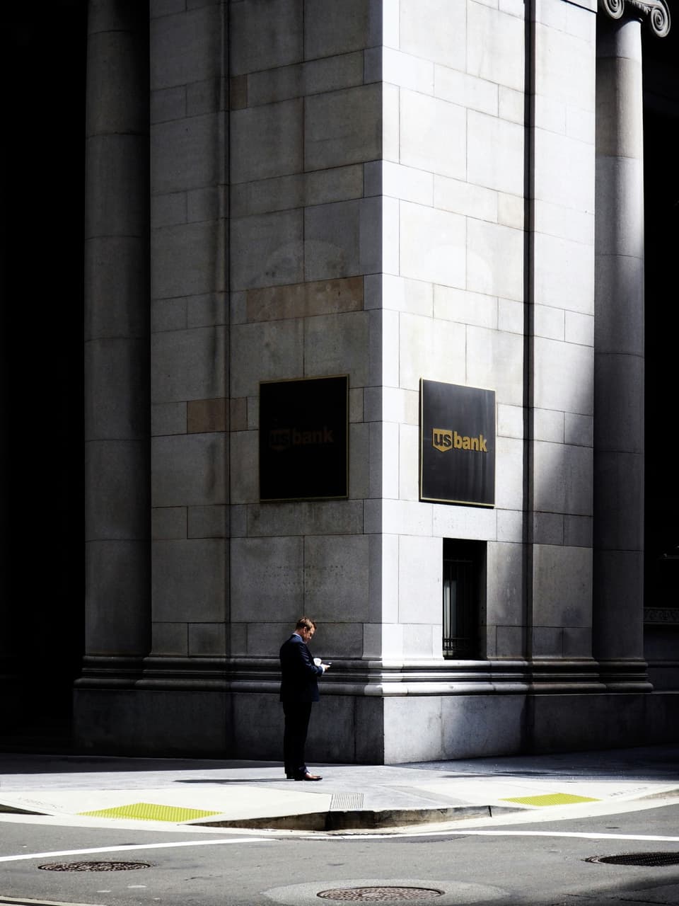 Urban bank building exterior — banks and card issuers as charge-off portfolio sellers