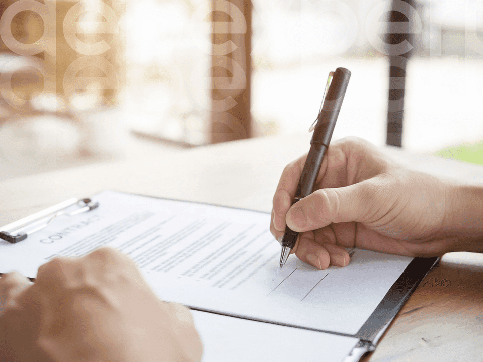 64b6839c20892df49e0bae57_64abc3f608394f50edc66f56_A-20man-20signs-20a-20loan-20a.png