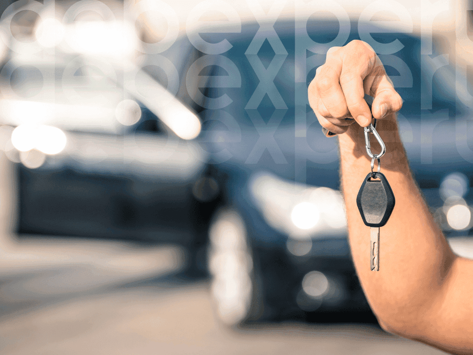 64dd0704435911134e6bf47f_A-man-holds-the-keys-to-a-car-he-bought-on-loan.png