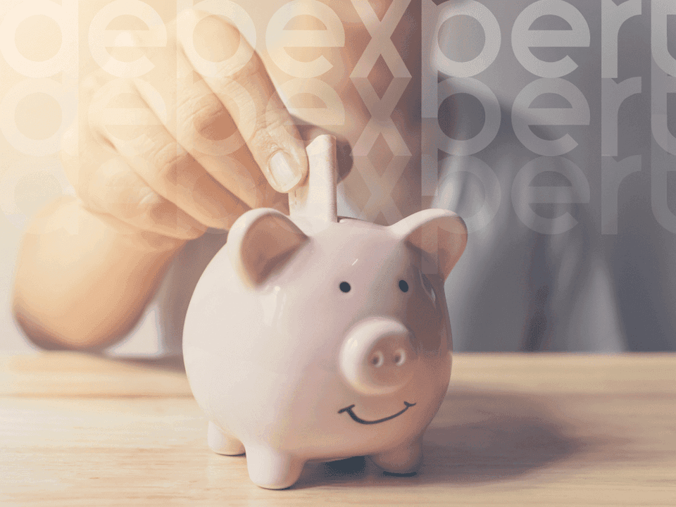 64e490edda57ee2201629e33_A-piggy-bank-with-money-for-a-mortgage.png