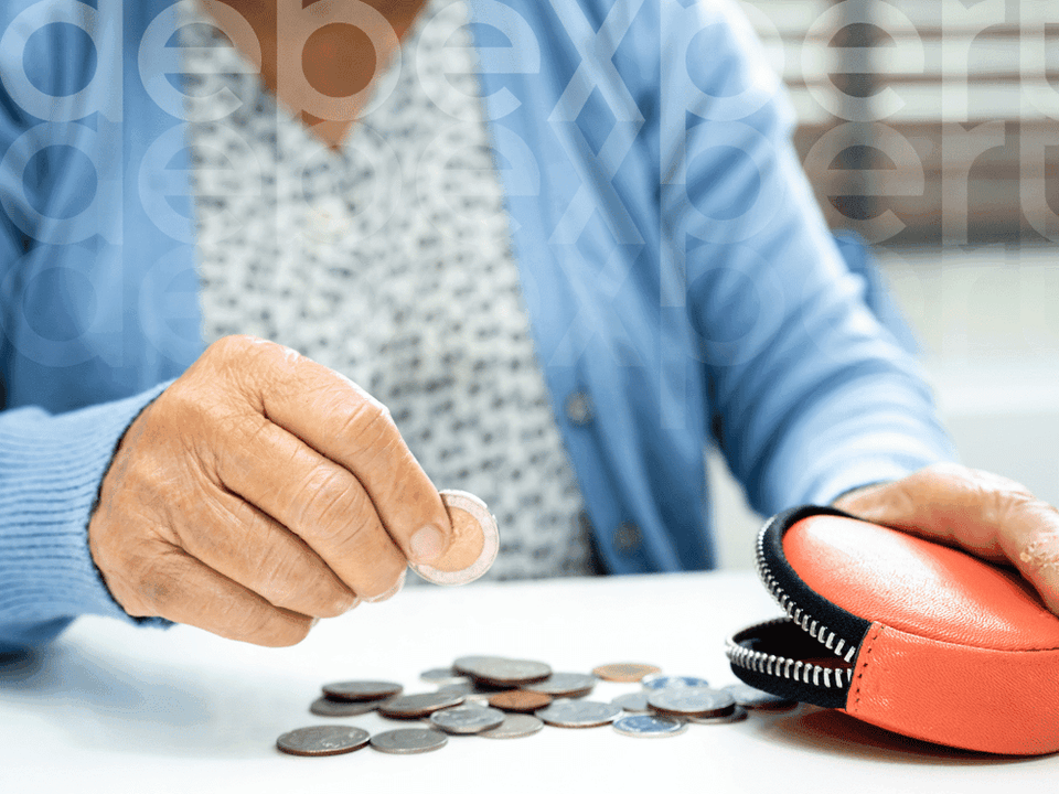 64e4916ee6cd86a301d450f0_A-woman-counts-coins-for-a-mortgage.png