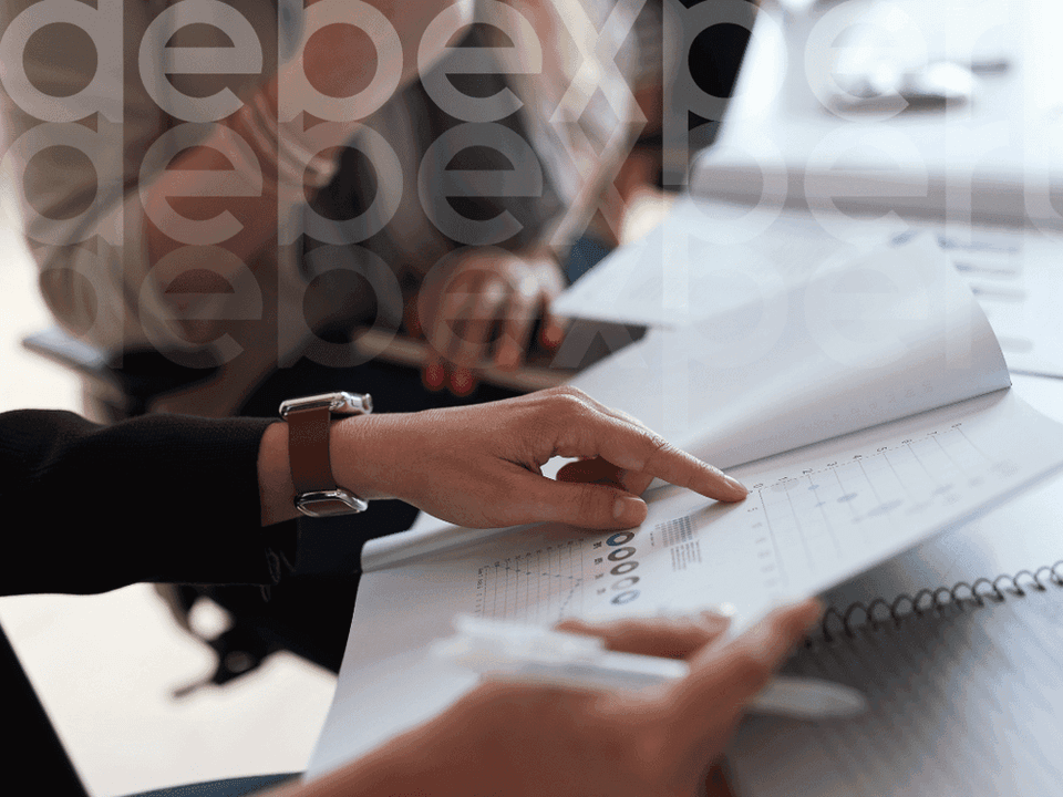 6501bb280bc9af1ab92d53d7_A-person-holds-documents-for-a-mortgage.png