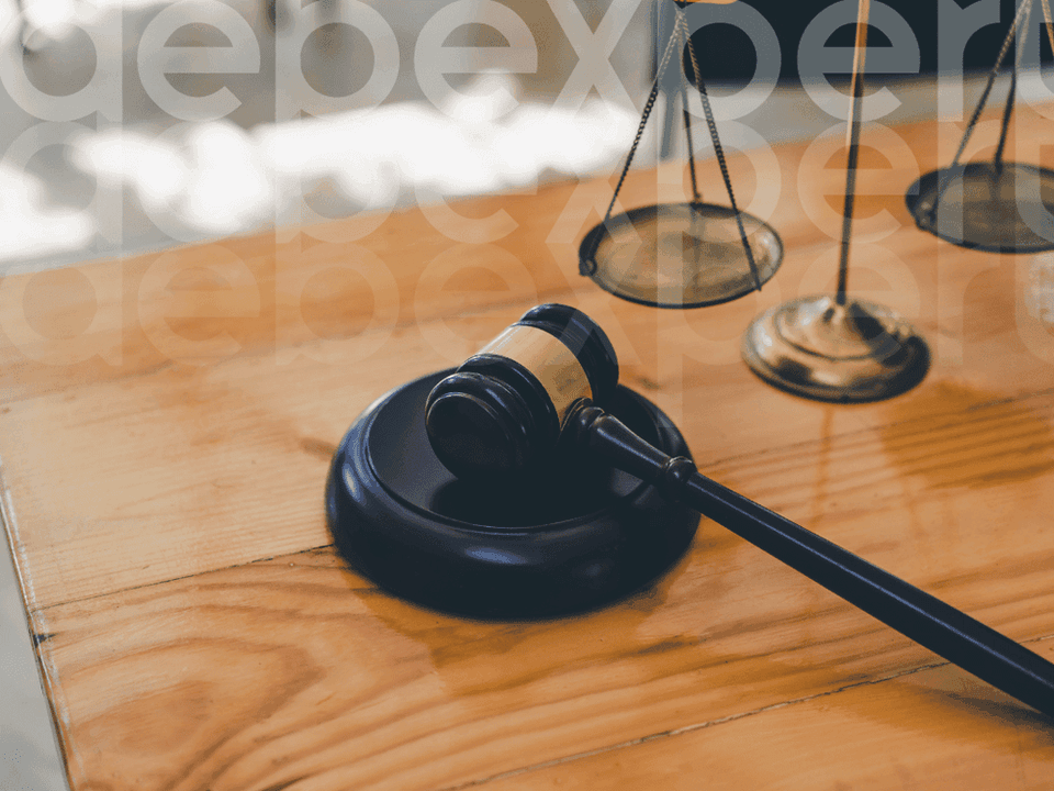 65165348fc76fd66f4a70268_The-judge-s-gavel-on-the-table.png